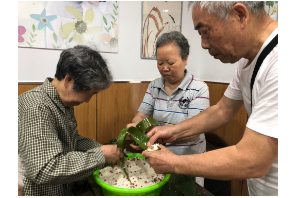 【阳光公益·天乐站】“弘扬传统文化  情系浓情端午”包粽子活动